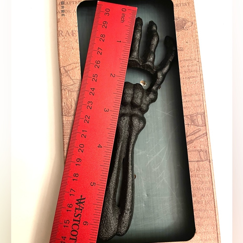 Skeleton Hand and Arm Cast Iron Bottle Opener - Picture 2 of 3